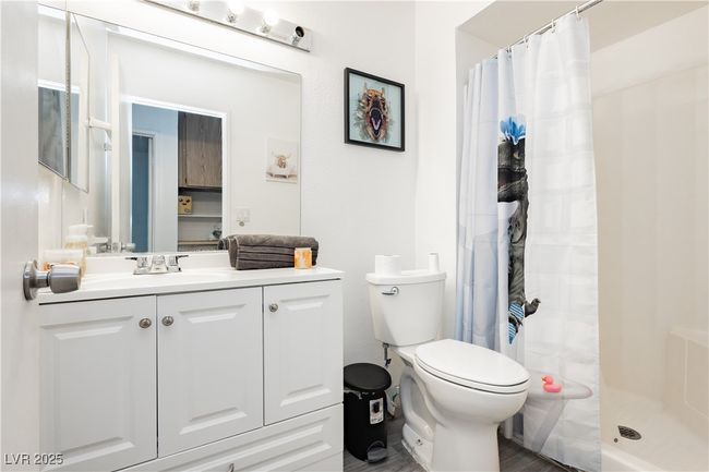 Full bathroom featuring vanity and a shower with curtain | Image 16