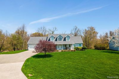 6880 N Lakeshore Rd, Home with 5 bedrooms, 3 bathrooms and null parking in Huron Twp MI | Image 2