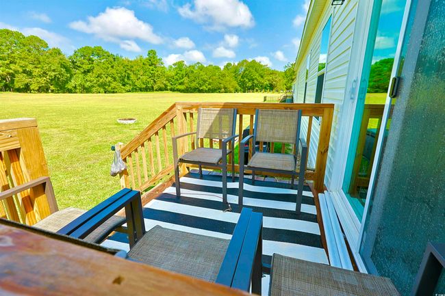 Deck featuring outdoor lounge area | Image 25