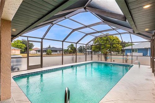 401 Candlewick Cir E, Lehigh Acres, FL, 33936-7706 | Card Image