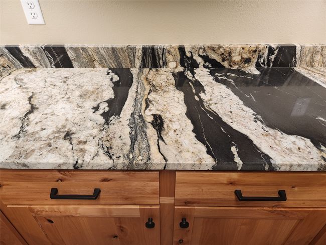 close up of granite counters | Image 22