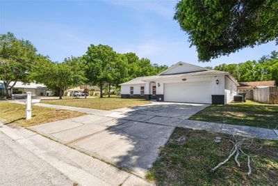 13913 Cherry Brook Lane, House other with 4 bedrooms, 2 bathrooms and null parking in Tampa FL | Image 1