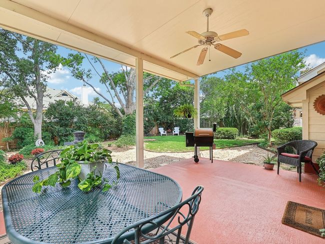View of patio / terrace with outdoor dining space, ceiling fan, and a fenced backyard | Image 30