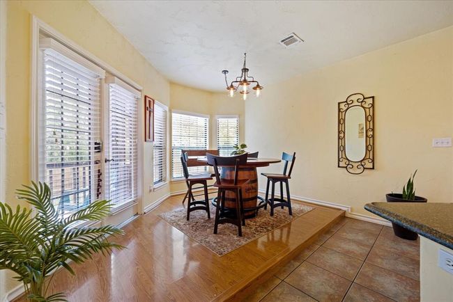 Great size breakfast nook looking out into the back yard. | Image 18