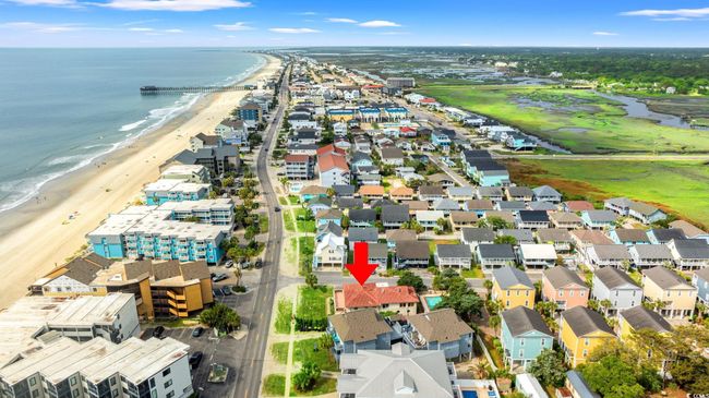 Aerial view of residential area with extended coastline | Image 28