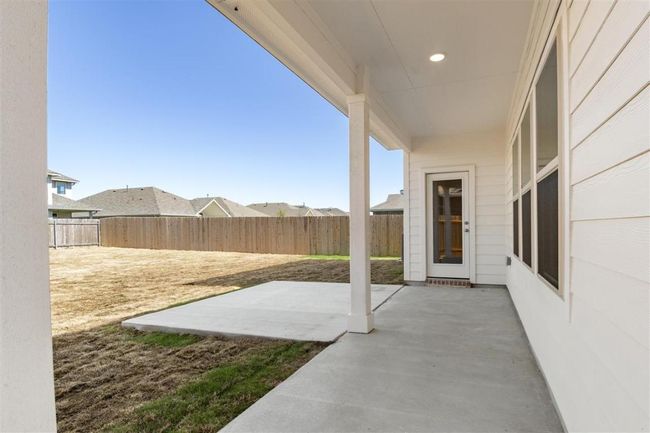 View of patio featuring a fenced backyard | Image 27