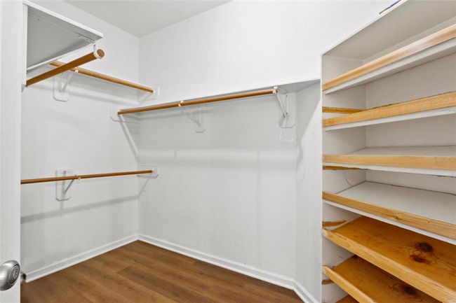 The Primary Bedroom has a roomy walk-in closet | Image 14