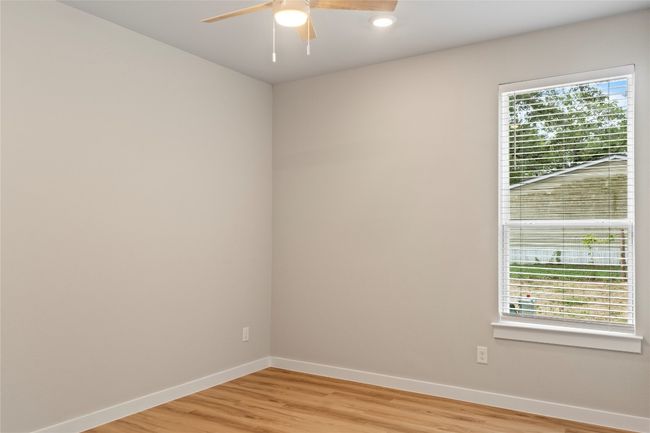 A warm and inviting bedroom, beautifully designed for comfort and relaxation. | Image 24