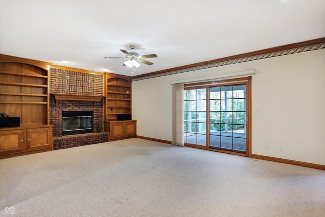 Great room note sliding glass doors that open to screened in covered porch | Image 20