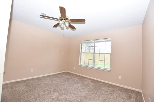 3rd bedroom, Spacious Layout: Ample room to accommodate a bed and additional furnishings, providing flexibility for various uses. | Image 22