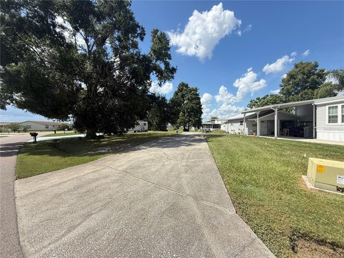 5058 Shore Line Dr, POLK CITY, FL, 33868-9658 | Card Image
