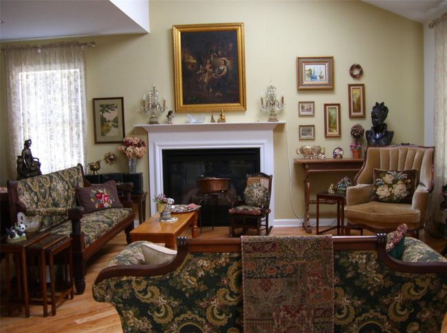 Living room featuring wood finished floors and a glass covered fireplace | Image 16