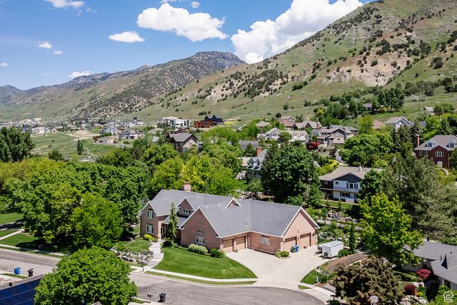 Aerial perspective of suburban area with a mountainous background | Image 110