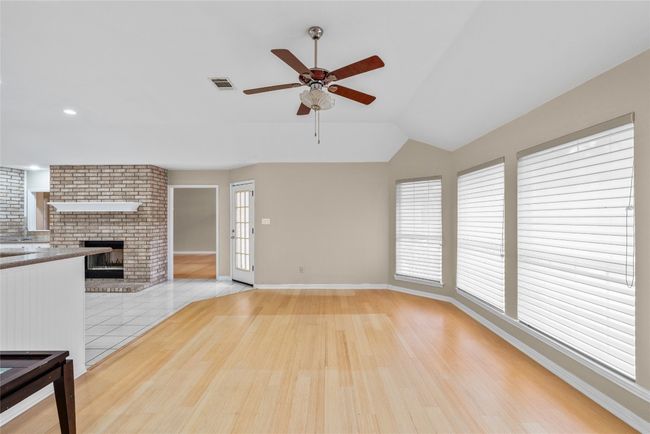 Family Room with door to outside deck and pool | Image 22