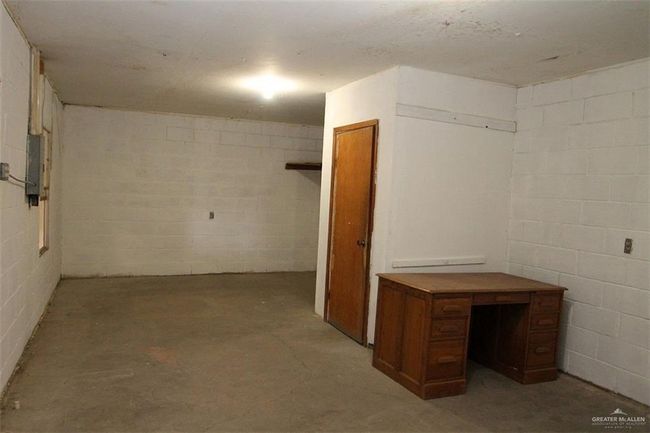 Basement featuring electric panel | Image 4