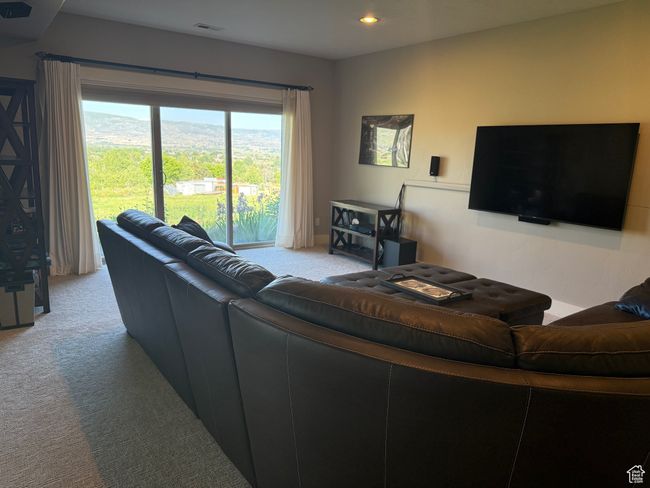 Carpeted living area and tv room with recessed lighting (and furnishings included) | Image 23