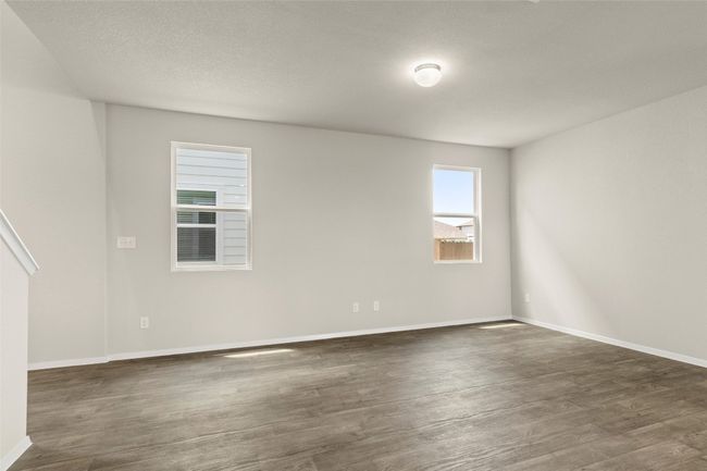Spare room with dark wood finished floors | Image 10