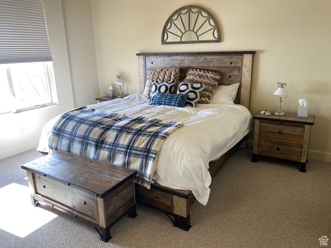Bedroom featuring carpet flooring and baseboards | Image 16