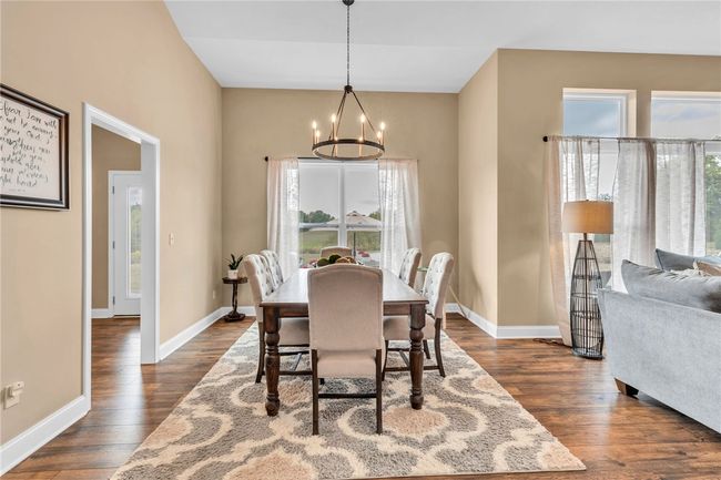 Expansive dining space perfect for hosting family and friends. | Image 8