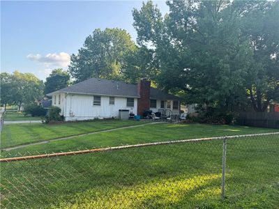 View of front facade featuring central AC and a front yard | Image 3