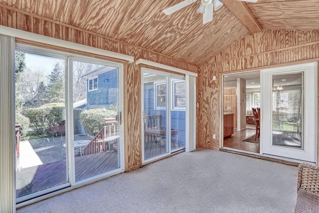 View of unfurnished sunroom | Image 14