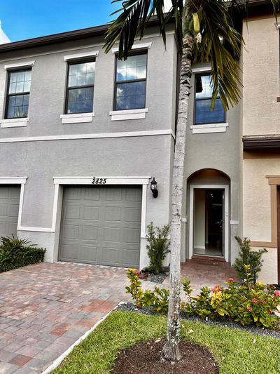 2825 Troubadour St Street, Townhouse with 3 bedrooms, 2 bathrooms and null parking in Palm Springs FL | Image 1