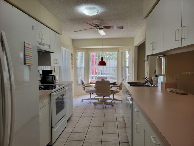 Galley Kitchen, looking toward Eat-in Area | Image 10