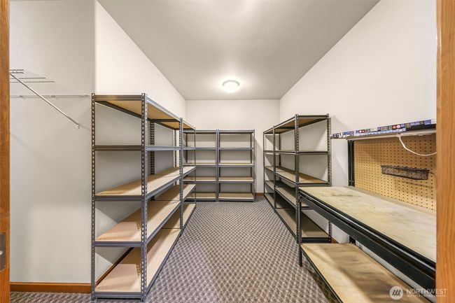 Shelves stay in the large storage area | Image 30
