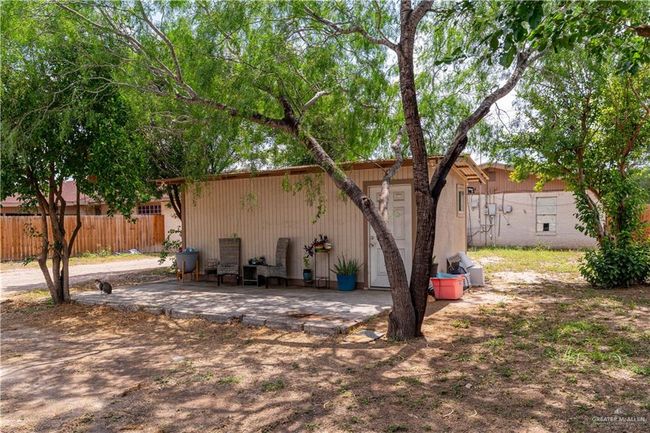 Back of property featuring an outbuilding | Image 6