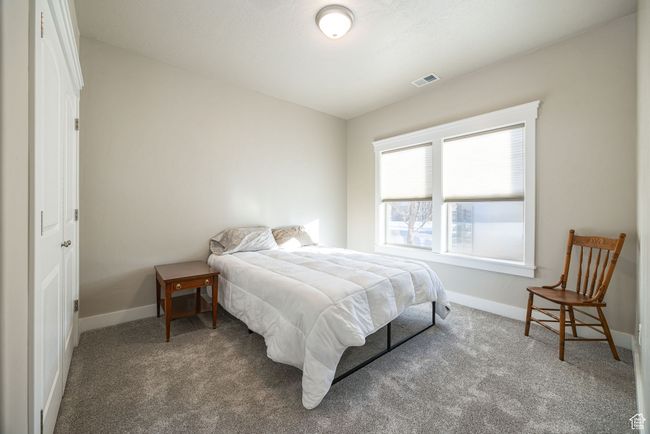 View of carpeted bedroom | Image 11