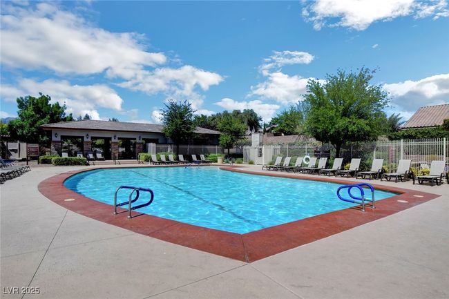 Community pool featuring a patio area | Image 72