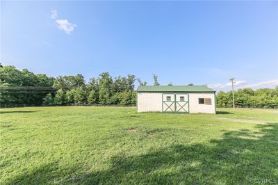 View of yard featuring an outbuilding | Image 2