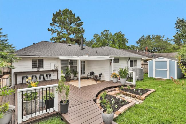 Whether hosting summer barbecues or enjoying quiet mornings with coffee, this generous outdoor living space offers endless possibilities for relaxation and fun. | Image 32