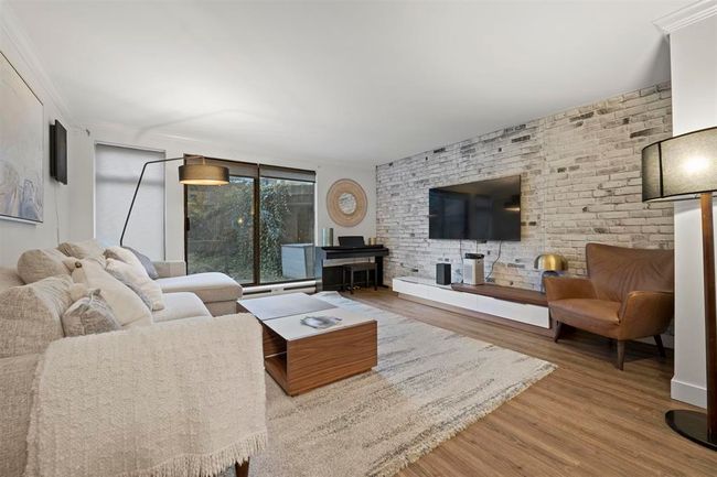 Living area featuring wood finished floors | Image 4