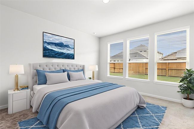 The primary bedroom is spacious and comfortable! | Image 16