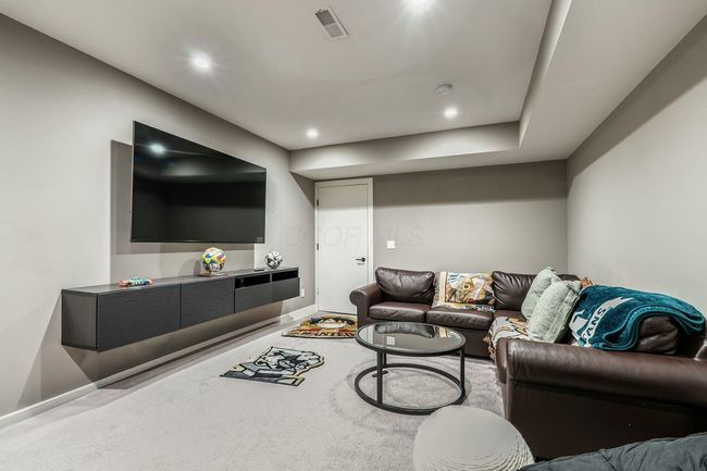 finished lower level family room | Image 11
