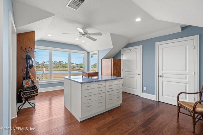 Primary Closet Area w/ Island Storage | Image 48