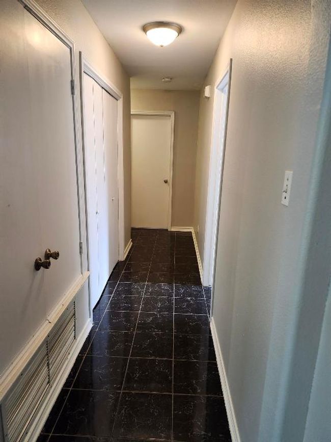 Corridor featuring baseboards | Image 6