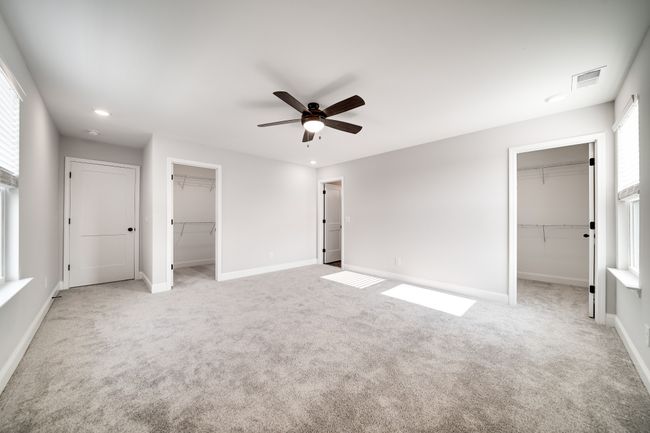 Oversized Primary bedroom with 2 walk in closets. | Image 26
