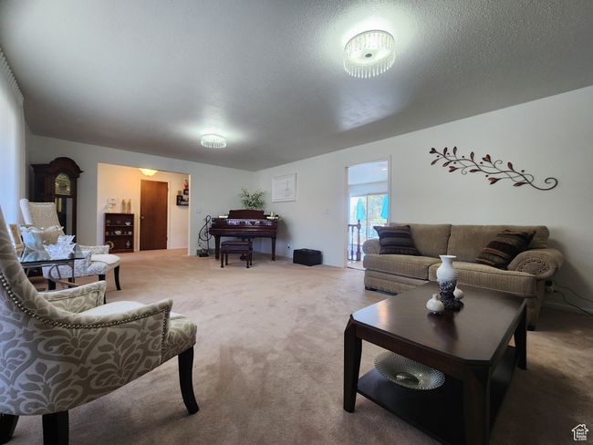 Living room featuring carpet flooring | Image 5