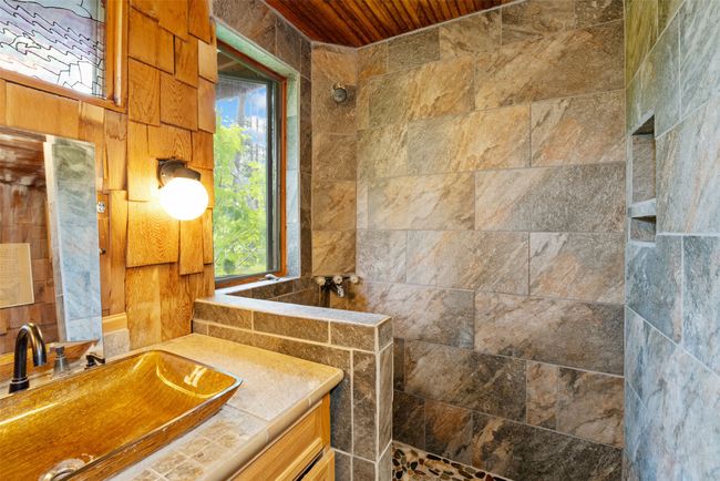 Full bathroom featuring walk in shower, wooden ceiling, and vanity | Image 23