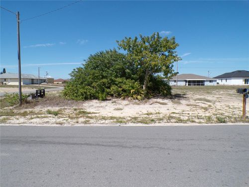 821 Ne 15th Ln, Cape Coral, FL, 33909-1487 | Card Image