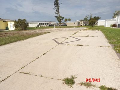 Driveway with cleared lot to your left | Image 2