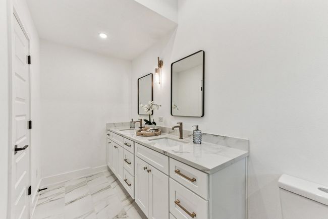 Indulge in a spa-style experience every day in this stunning ensuite. | Image 15