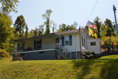 Front view of house with a yard | Image 1