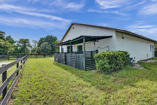 502 Rambling Drive Cir, House other with 5 bedrooms, 3 bathrooms and null parking in Wellington FL | Image 83