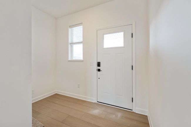 Photo is of the actual home. Make the best first impression with this bright and open foyer. | Image 7