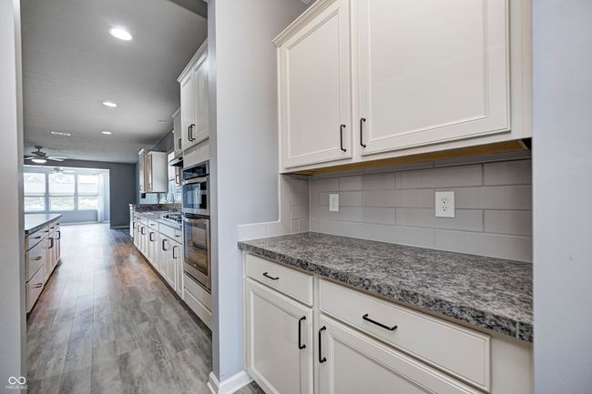 Prep area across from the large walk-in pantry. | Image 19