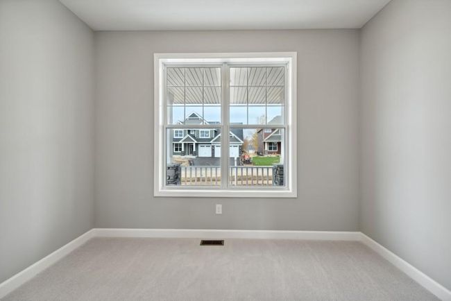 (Photo is of an inventory home, actual homes finishes will vary) This main level study provides a perfect setting for those working from home or completing a school project. | Image 9
