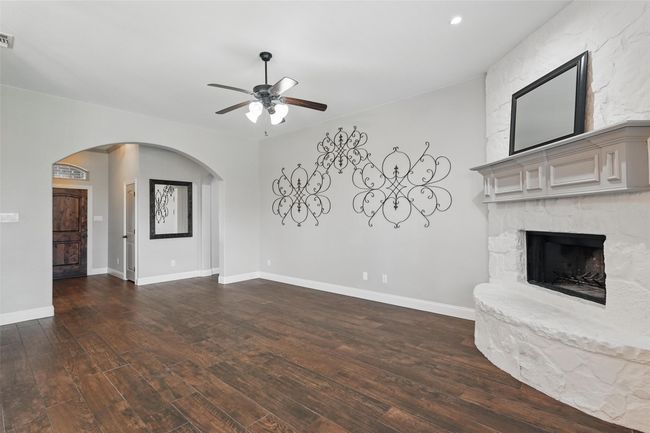 Large living area with beautiful Fireplace | Image 10